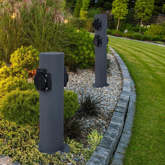 Outdoor garden power socket bollard lights installed in a landscaped garden | SUNSATU Outdoor Lighting Guide