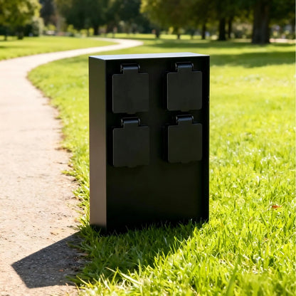 IP44 waterproof black outdoor garden socket post placed along a park lawn and walking path