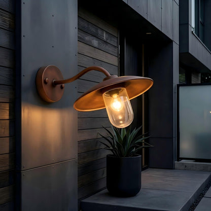 Modern outdoor wall light used for porch and entryway lighting, enhancing the home's exterior design and atmosphere.