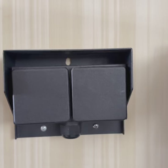 emonstration of plugging electrical cords into the outdoor IP44 waterproof wall socket