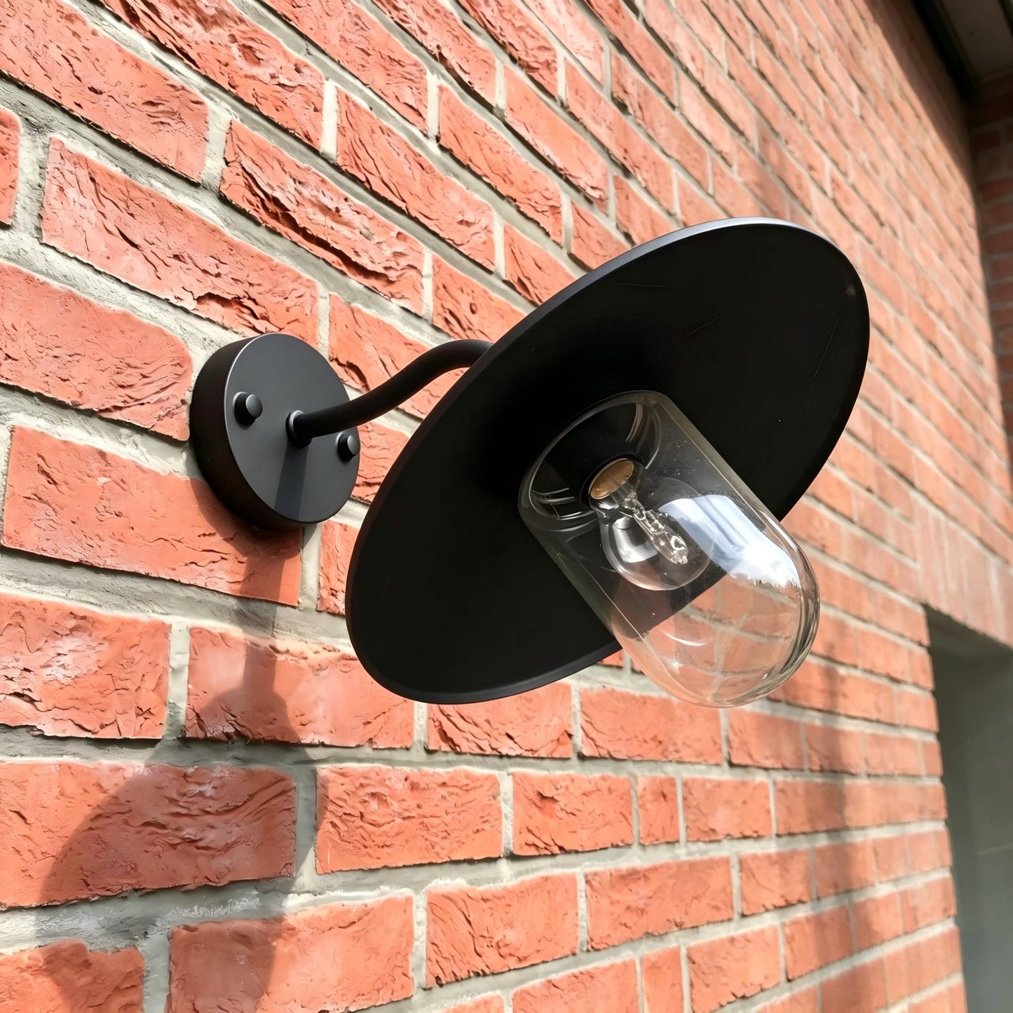 A pair of Sunsatu industrial porch sconces mounted symmetrically on both sides of a modern front entryway