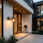 Outdoor wall sconce glowing warmly at night, providing ambient lighting for entrances, patios, and exterior walls.